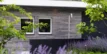 Buitendouche in RVS voor tuin en zwembad, modern design en duurzame afwerking.