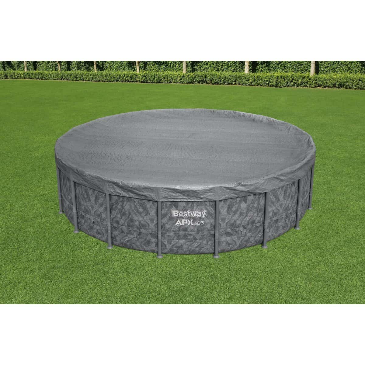 Opblaasbaar zwembad met overkapping op groene tuin.